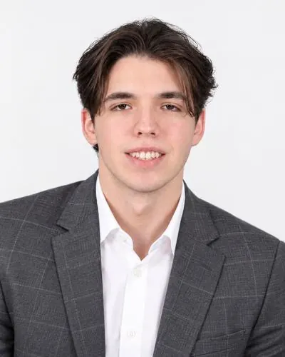 Portrait of Alex, Systems Support Specialist at Lampyris